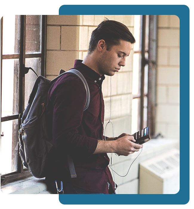 young man listening to headphones